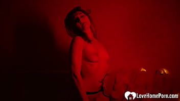 Solo redhead masturbates in the red light