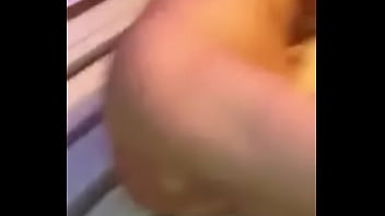 Blonde milf caught in tanning booth