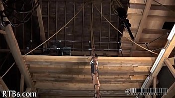 Girl is stripping inside cage