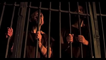 The guard fucks the beautiful prisoner in the ass