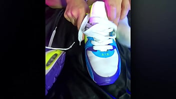 The girl feels her sneakers and shows you aesthetic foot fetish pleasure