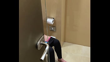 Busty girl watches porn and jerks off on the toilet peeping