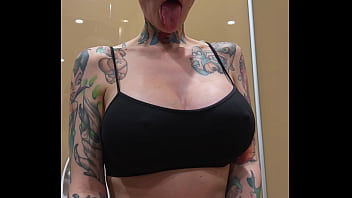 Busty girl watches porn and jerks off on the toilet peeping