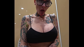 Busty girl watches porn and jerks off on the toilet peeping