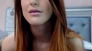 Sexy redhead webcam stripshow