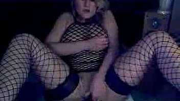 Busty webcam chick in fishnets