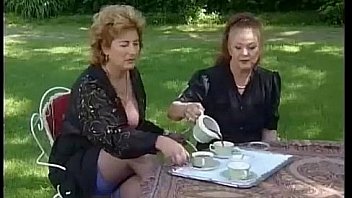 Two grannies take tea and cock