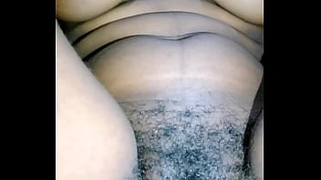 African lady letting hairy pussy out