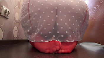 The camera watches from the side as a busty milf fucks with a dildo and records a video gorgeous big tits