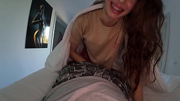 Morning surprise waking him up with kisses under the sheets