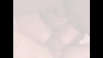 Skanky raven haired lass with tats devours interracial cocks