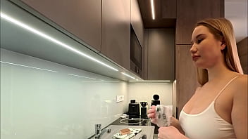 Big tits big ass beautiful and cute blonde in the kitchen in a short skirt shows her long legs and gets bored and ignored