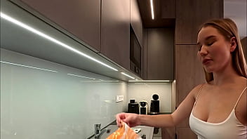 Big tits big ass beautiful and cute blonde in the kitchen in a short skirt shows her long legs and gets bored and ignored
