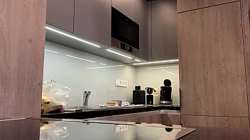 Big tits big ass beautiful and cute blonde in the kitchen in a short skirt shows her long legs and gets bored and ignored