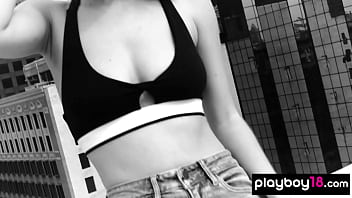 Confident red teen beauty reveals her amazing natural boobs