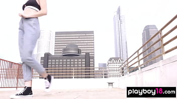 Confident red teen beauty reveals her amazing natural boobs