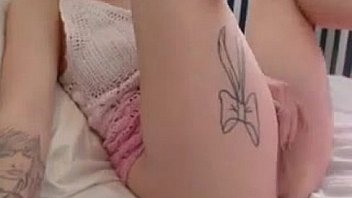 Slut masturbates on a pink ball