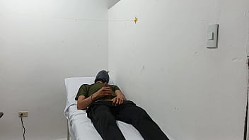 Kinky doctor masturbates his cock in the office