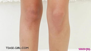 Elegant brunette siren gives a tease