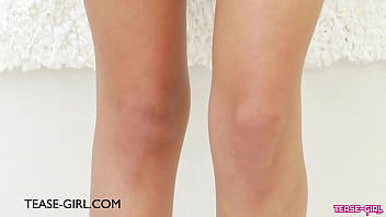 Elegant brunette siren gives a tease