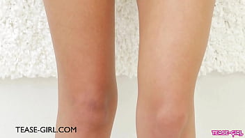 Elegant brunette siren gives a tease