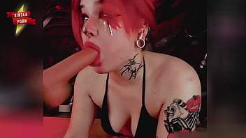 Harley quinn sucks hard on a dildo that stretches her cheeks