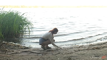 Teen redhead mia hits a wild orgasm beside the lake
