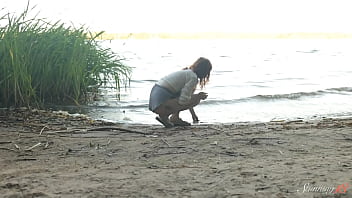 Teen redhead mia hits a wild orgasm beside the lake