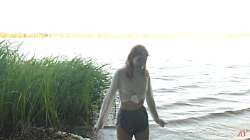 Teen redhead mia hits a wild orgasm beside the lake