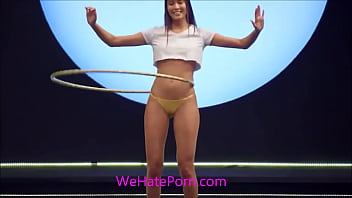 Cute bikini babe shows off her hulahoop skills as the camera zooms into her ass