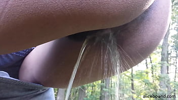 Sexy black girl pissing outdoors Sexy black girl pissing outdoors