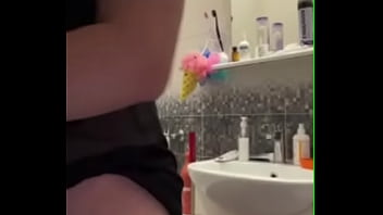 Stepmom masturbates her pussy in the bathroom