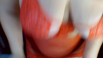 Latina in a red camisole