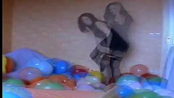 Sexy girl pop balloons more on