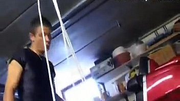 Mature slut sucks him in garage