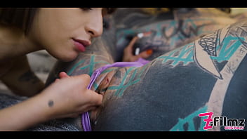 The tattooed girl enjoys making her lesbian friends anal gapes