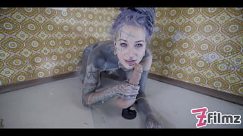 Alternative tattoo model masturbating with big toy