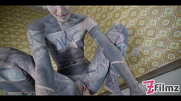 Alternative tattoo model masturbating with big toy