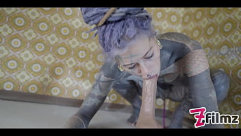 Alternative tattoo model masturbating with big toy