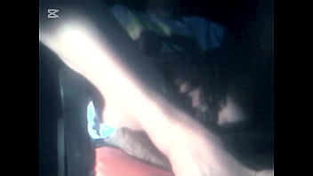 The camera under the table captured a beautiful woman at home alone and watching a porn movie