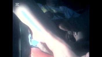 The camera under the table captured a beautiful woman at home alone and watching a porn movie