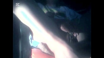 The camera under the table captured a beautiful woman at home alone and watching a porn movie