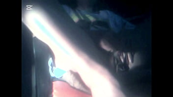 The camera under the table captured a beautiful woman at home alone and watching a porn movie