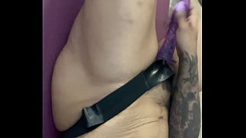 Strap on wearing ebony