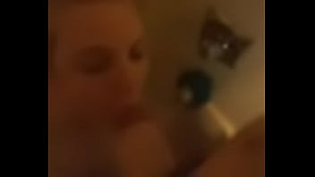Dick hungry girl deep throating in motel shower