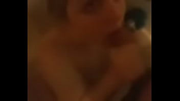 Dick hungry girl deep throating in motel shower