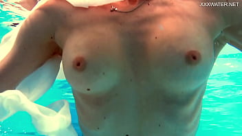 Russian pornstar anastasia ocean strips in the pool