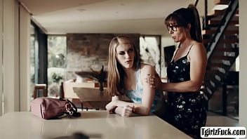 Watch lovely brunette milf shemale melanie brooks make out with petite small tits tranny babe izzy wilde while the husband is away