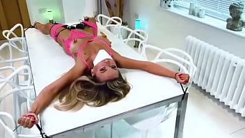Double vibrator on table tied up girl Double vibrator on table tied up girl