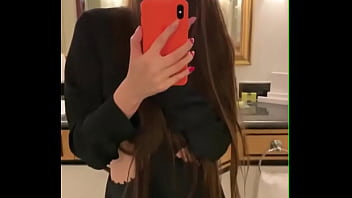 Sexy teen plays with herself in front of the mirror